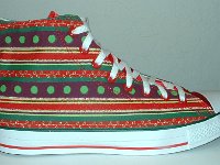 Christmas High Top Chucks  Outside view of a right holiday pattern and red satin 2-tone high top.